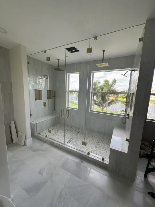 Frameless enclosure with a wide window view