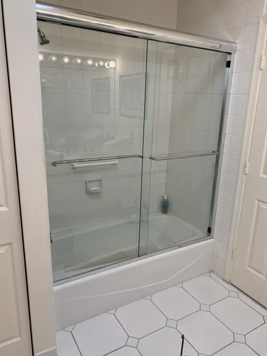 Sliding glass over a tub
